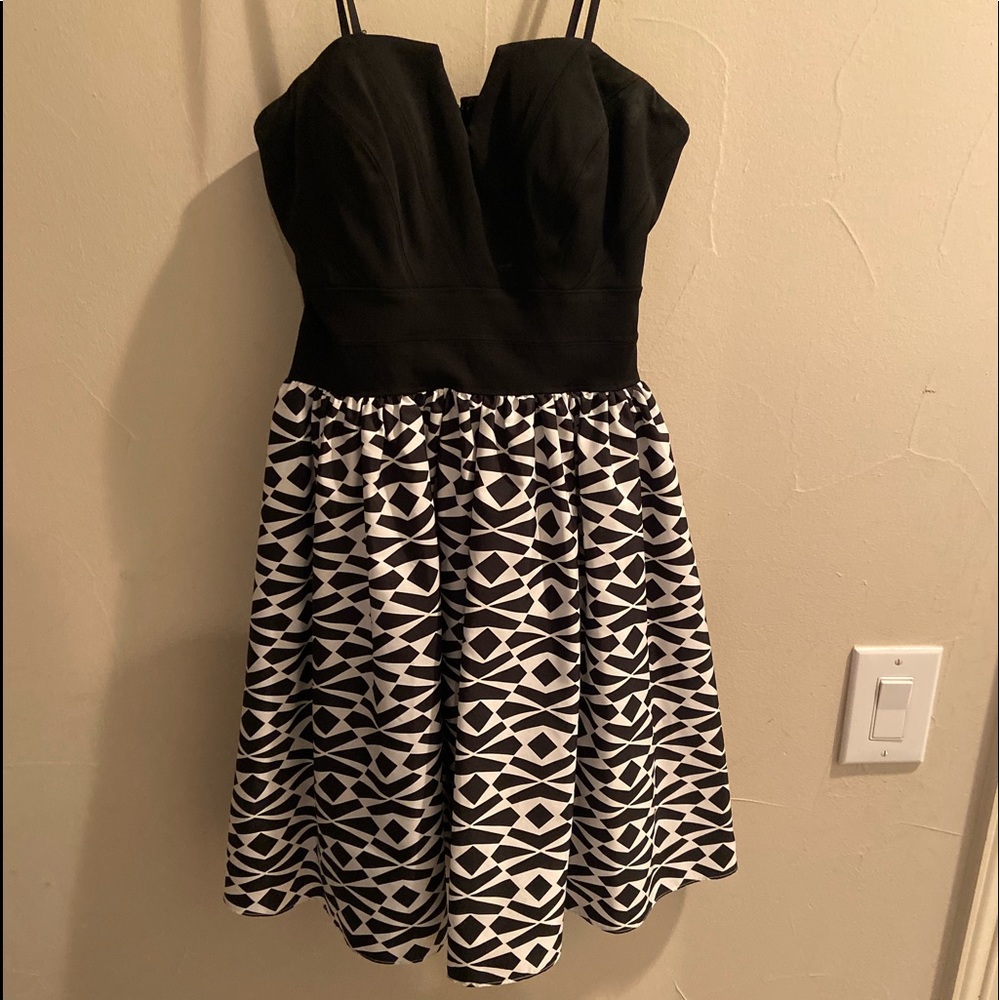 black with white and black skirt